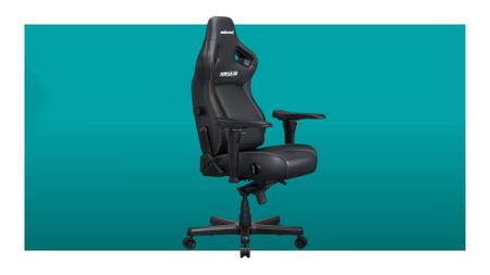 An image of a black AndaSeat Kaiser 4 XL against a teal background with a white border