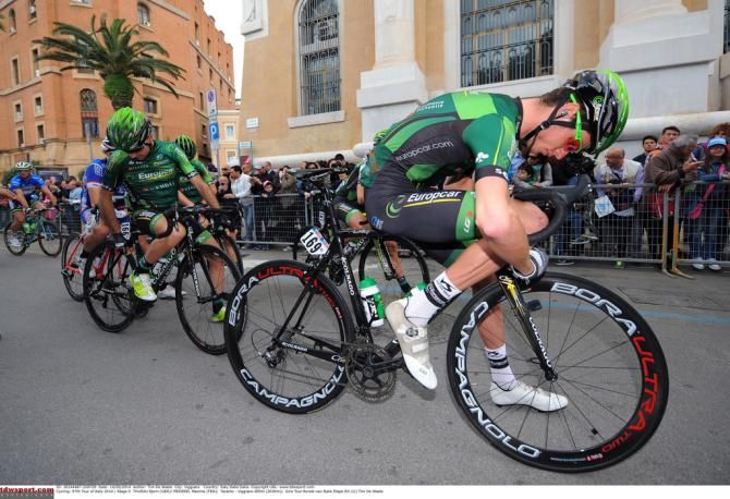Europcar riders checking their bikes on the startline