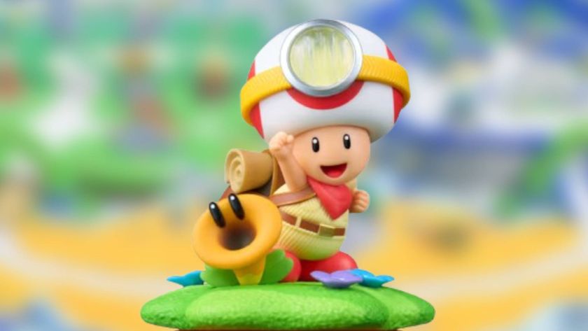 Screenshot from Super Mario Bros Wonder Switch 2 Edition blurred with the Captain Toad amiibo sitting in-front.