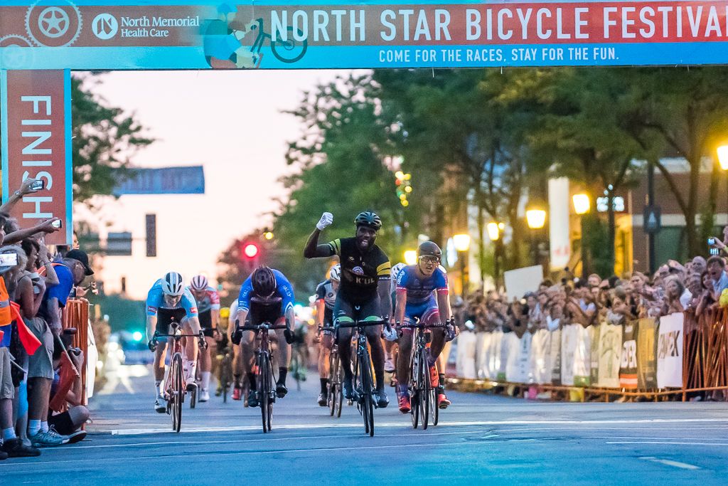 Justin Williams (Cylance) wins the Minneapolis stage ahead of Alfredo Rodriquez (KHS-Maxxis-JLVelo) and Brad Huff (Rally Cycling).