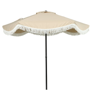 Better Homes &amp; Gardens 7.5' Beige Scallop with Cream Fringe Patio Umbrella: What good is your perfectly manicured garden if you don't have a place to rest? This Better Homes & Gardens patio umbrella gives you a spot to relax and enjoy the fruits (or veggies, I guess) of your labor.