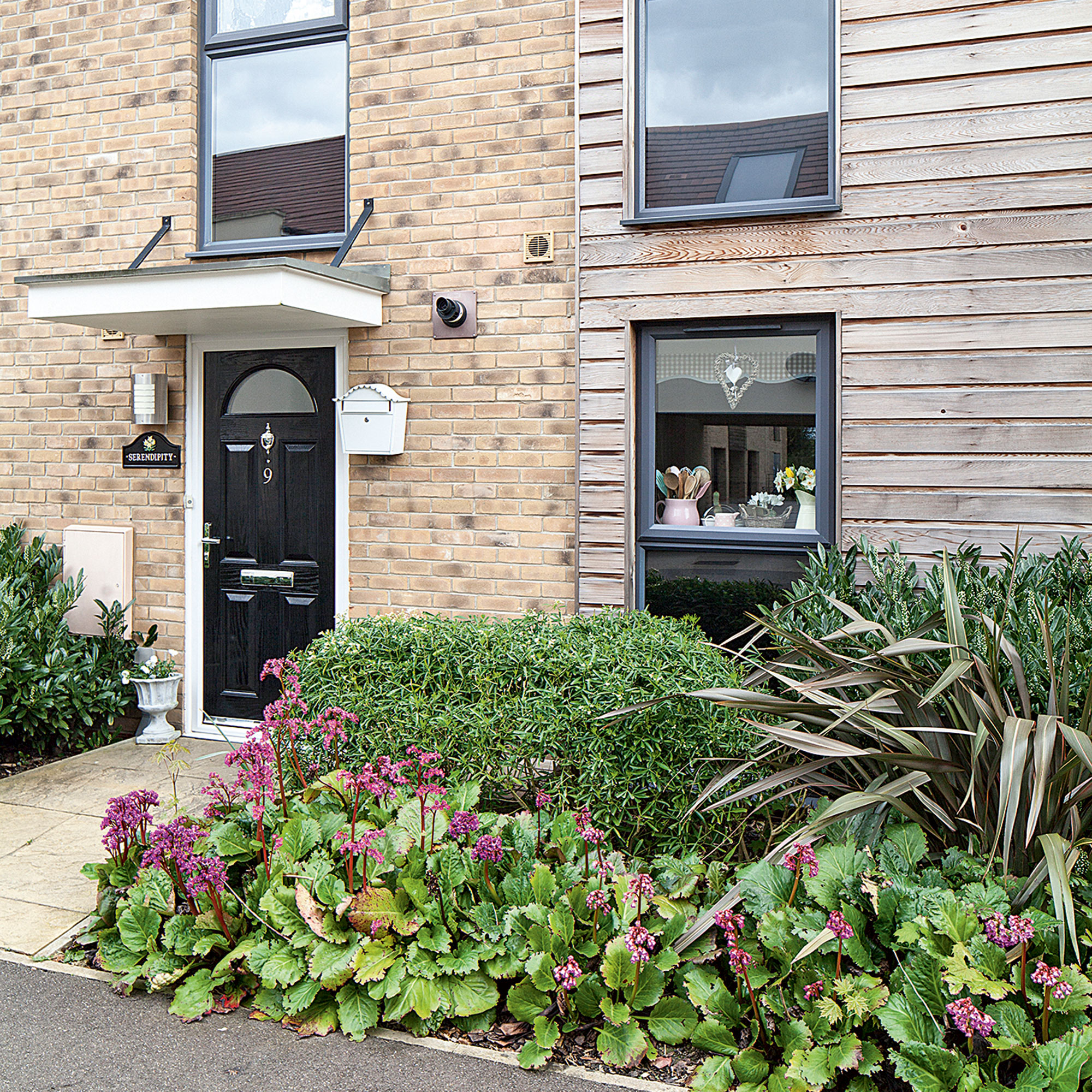 Front garden of new build with hedges