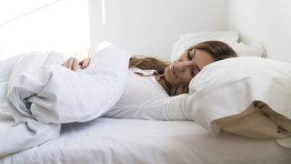 sleep divorce woman waking in bed