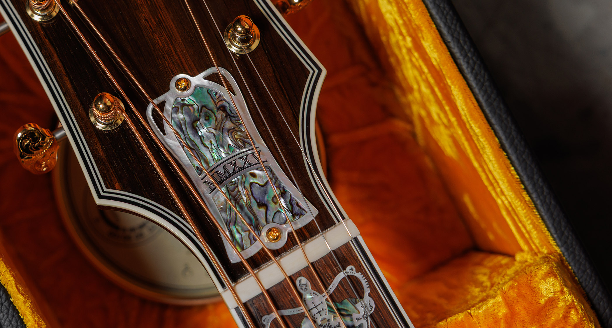 Gibson Custom SJ-200 Monarch #100: this stunning one-of-one jumbo is replete with all kinds of rococo flourishes, from the diamond and gold crown inlay on the headstock, to the 14k gold rope binding, Gibson calls it the "ultimate custom" acoustic and not without some justification.