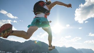 A runner taking a big leap