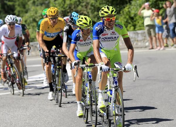 Ivan Basso sets tempo for teammate Vincenzo Nibali late in stage 16.