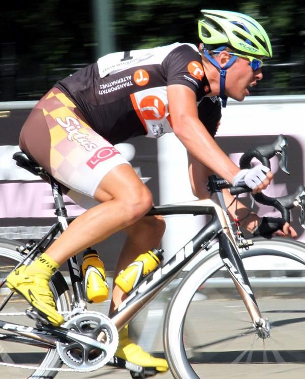 Germany's Benjamin Edmuller (TA/R) takes a flyer and tries to break-away like last year - but it's not working for him in 2011.