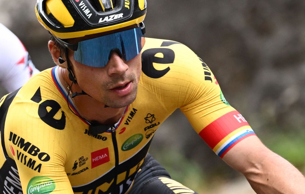 JumboVisma teams Slovenian rider Primoz Roglic R rides during the first stage of the 74th edition of the Criterium du Dauphine cycling race 192 km between La VoultesurRhone and Beauchastel on June 5 2022 Photo by Marco BERTORELLO AFP Photo by MARCO BERTORELLOAFP via Getty Images