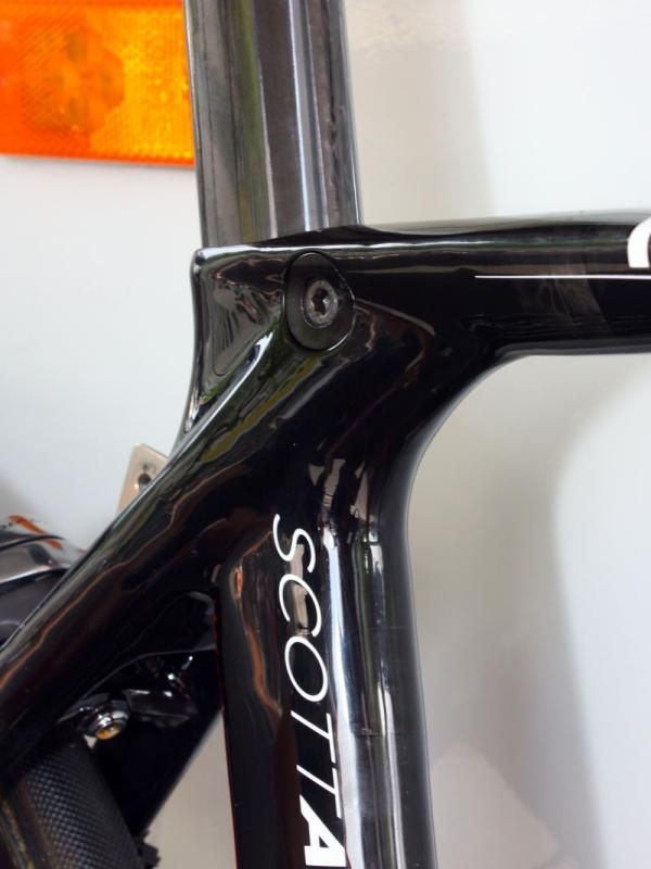 The seatpost binder is neatly integrated into the frame.