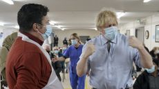 Boris Johnson visits a COVID-19 vaccination centre in Batley
