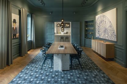 Sandelsandberg stockholm apartment dining room with wooden floor and mint wall panelling