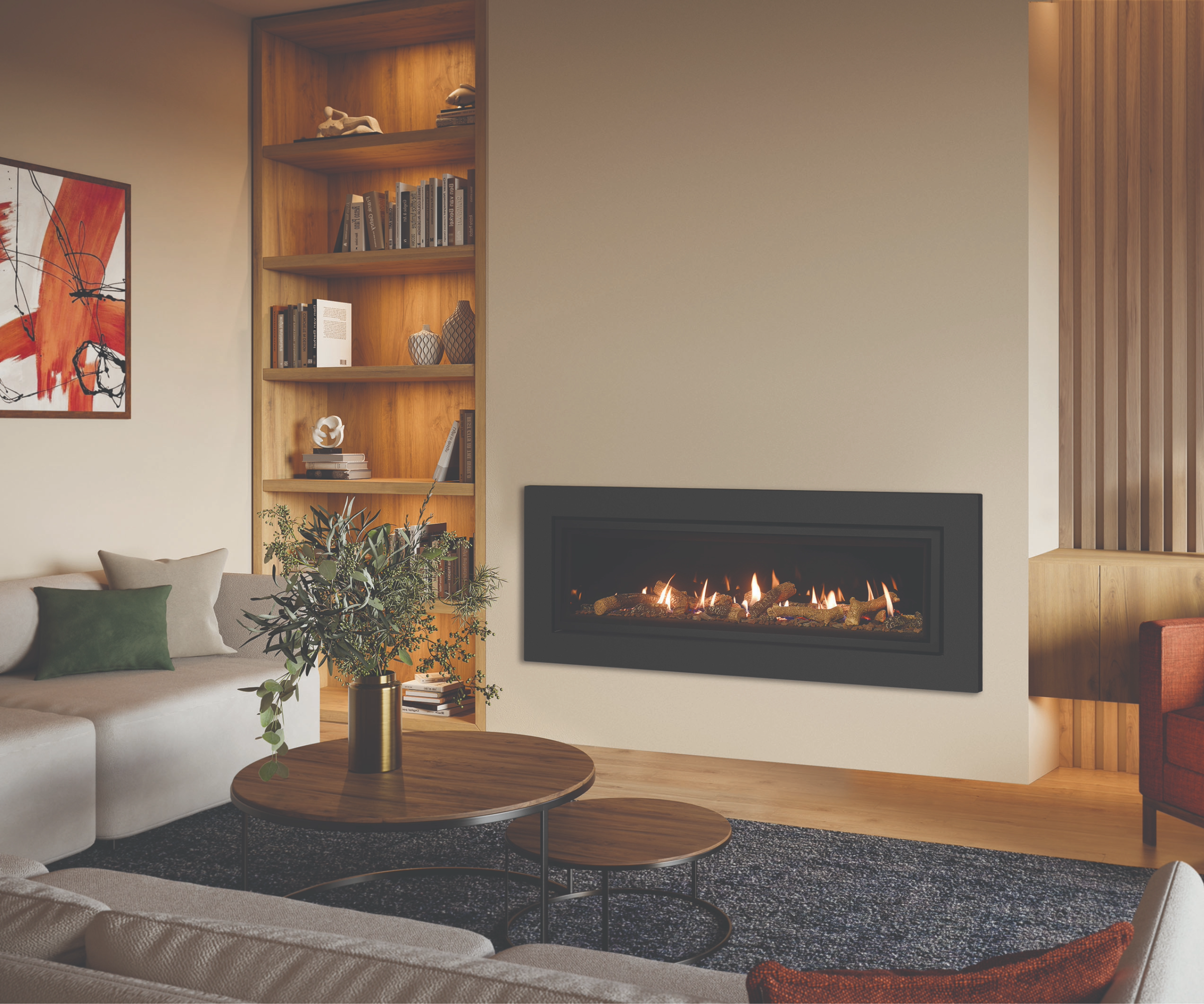 Living room with alcove that has shelves and is lit up