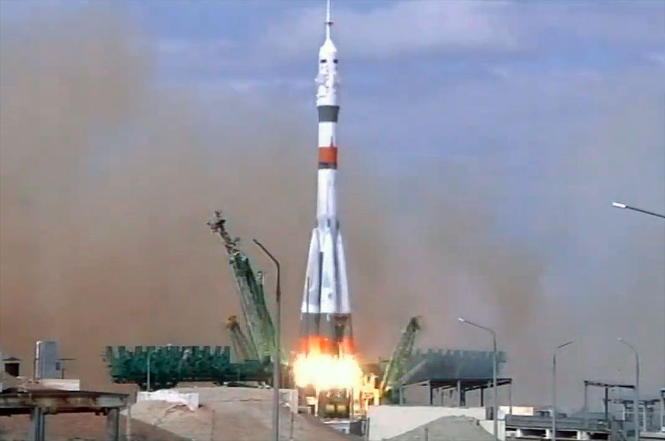 Soyuz crew 'socially distances' from Earth with launch to space station