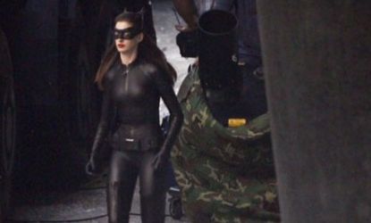 Critics pounce after the paparazzi captures this early glimpse of Anne Hathaway in her full Catwoman costume.