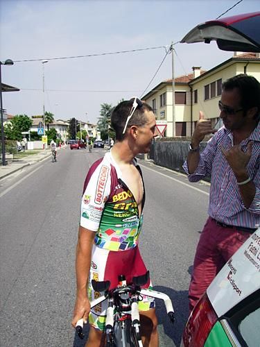 Porte speaks with team director Andrea Tafi following his ride in the Girobio time trial.