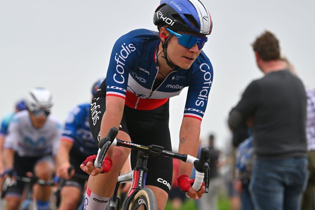 ROUBAIX FRANCE APRIL 06 Victoire Berteau of France and Cofidis Women Team competes passing through the Mons en Pevele cobblestones sector during the 4th ParisRoubaix Femmes 2024 a 1485km one day race from Denain to Roubaix on UCIWWT April 06 2024 in Roubaix France Photo by Luc ClaessenGetty Images