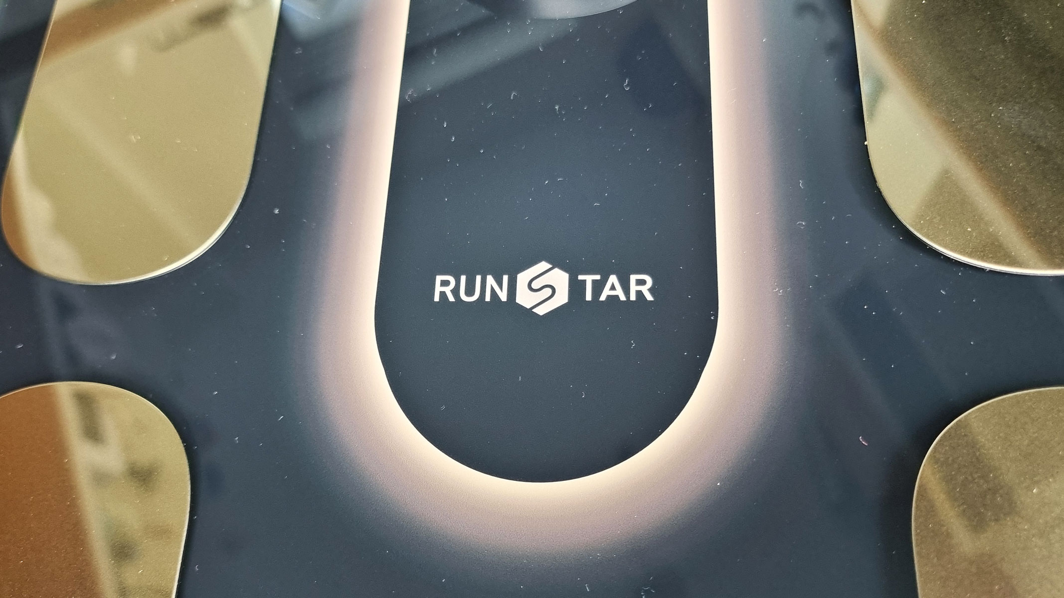 A close-up picture of the logo on the RunStar 8E SmartScan Pro smart scale