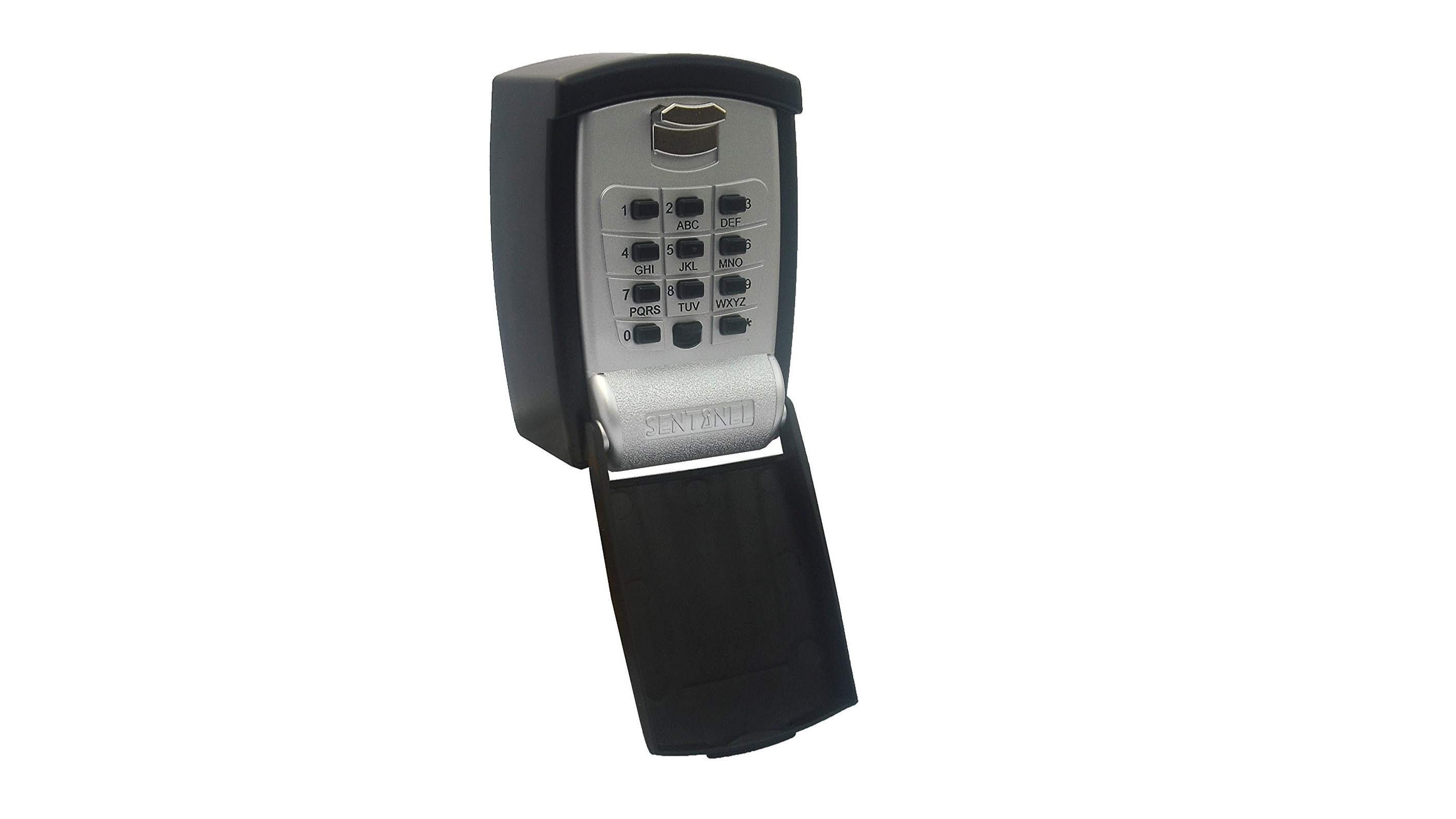 A Sentinel branded push button steel key safe with 10-key capacity