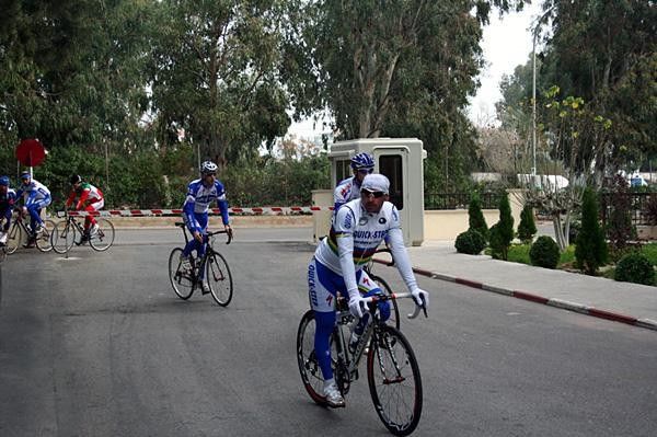 Paolo Bettini leads the riders back to the hotel - his rainbow kit almost identical to last year's.