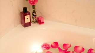 Rose petals in a bath of water