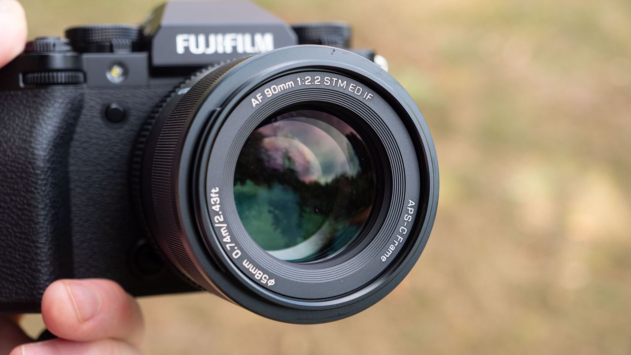 Close up of the front lens element of the Viltrox AF 90mm f/2.2 EVO lens