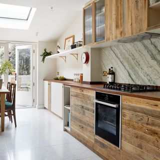 Vinyl wood look counter tops and cupboards in marble floor kitchen