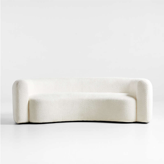 curved white boucle sofa