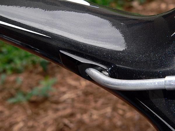 Rear brake cable stop is removable to facilitate snaking a cable through the top tube in case you forget to insert a liner first during service.