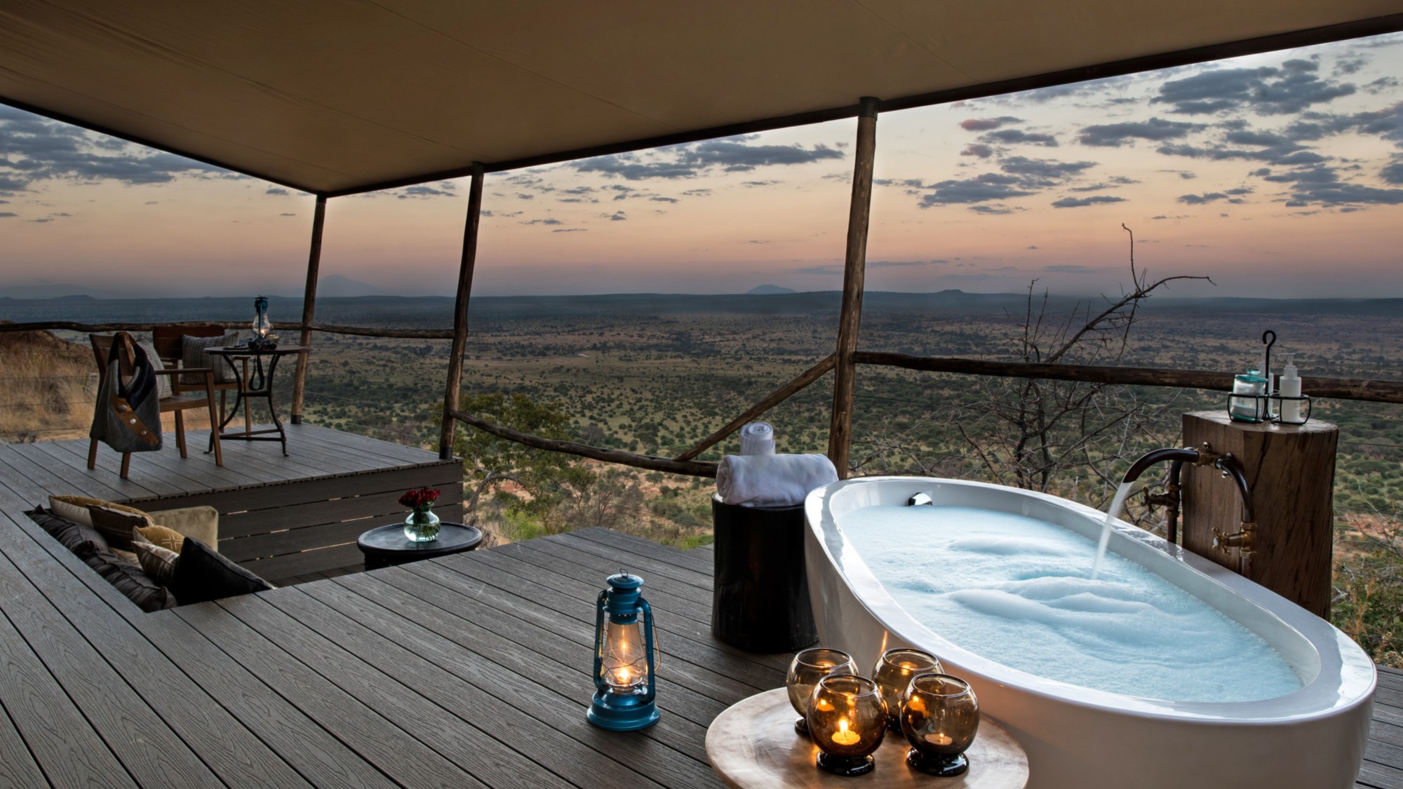View from deck overlooking Tarangire national park in Tanzania, with outdoor bath tub