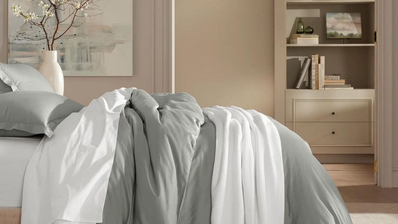 A Boll &amp; Branch comforter on a bed.