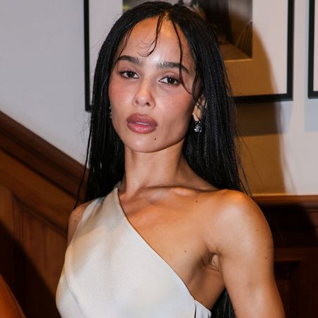 Zo&euml; Kravitz styled a one-shoulder bridal slip at a Jessica McCormack event in London