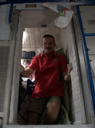 Chris Hadfield in ISS Sleep Pod