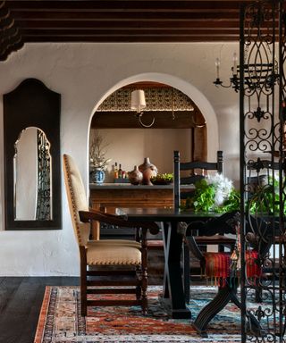 A view to a spanish-style dining room and kitchen