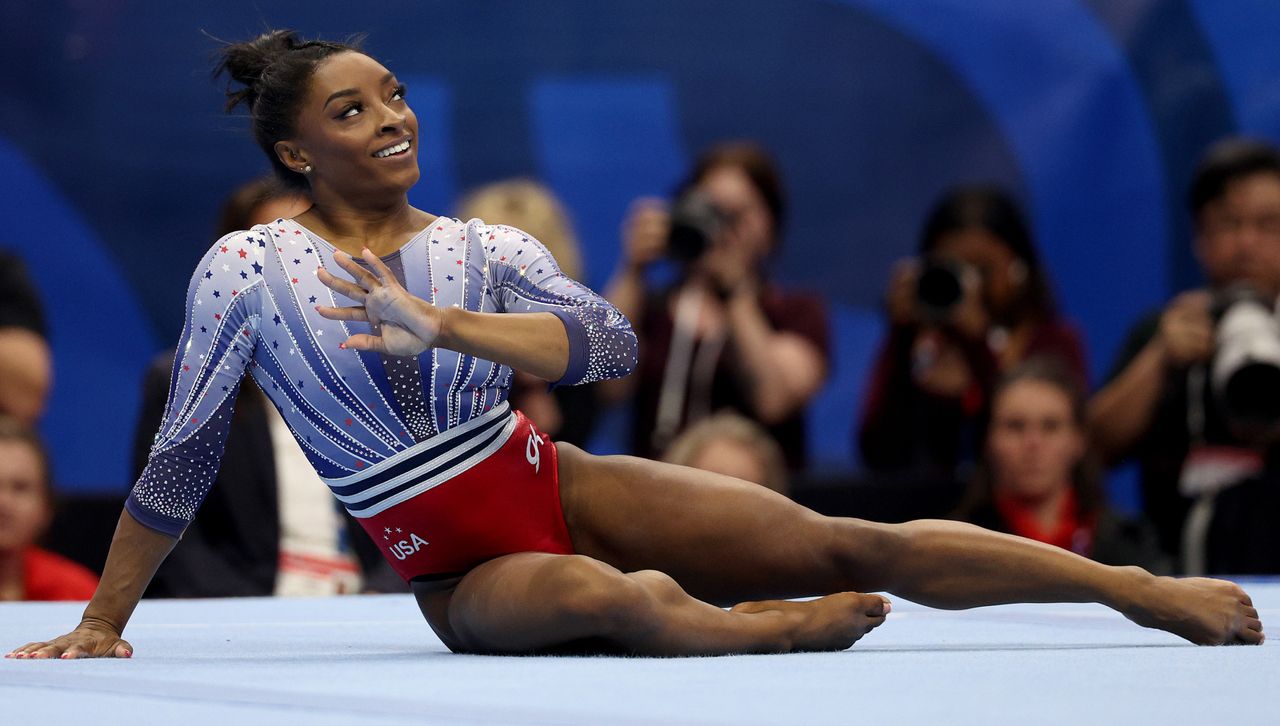 Simone Biles at the US Olympic trials wearing a red white and blue leotard