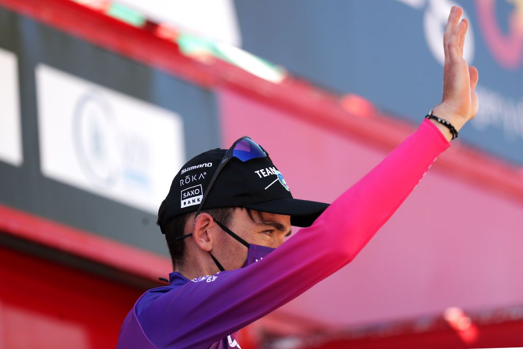 ARANDA DE DUERO SPAIN AUGUST 06 Romain Bardet of France and Team DSM Team Purple Leader Jersey celebrates at podium during the 43rd Vuelta a Burgos 2021 Stage 4 a 149km stage from Roa to Aranda de Duero VueltaBurgos BurgosCycling CapitalMundialdelCiclismo on August 06 2021 in Aranda de Duero Spain Photo by Gonzalo Arroyo MorenoGetty Images