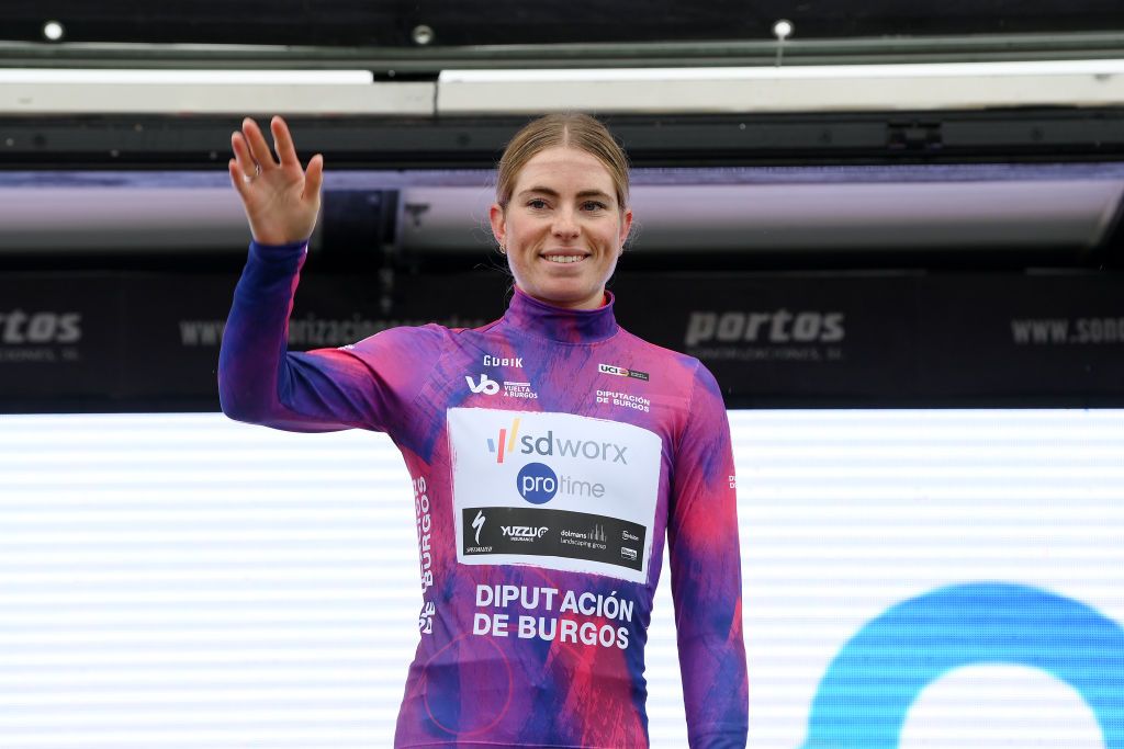 CANICOSA DE LA SIERRA SPAIN MAY 19 Demi Vollering of The Netherlands and Team SD Worx Protime Purple Leader Jersey celebrates at podium as overall race winner during the 9th Vuelta a Burgos Feminas 2024 Stage 4 a 122km stage from Pearanda de Duero to Canicosa de la Sierra 1144m UCIWWT on May 19 2024 in Canicosa de la Sierra Spain Photo by Alex BroadwayGetty Images