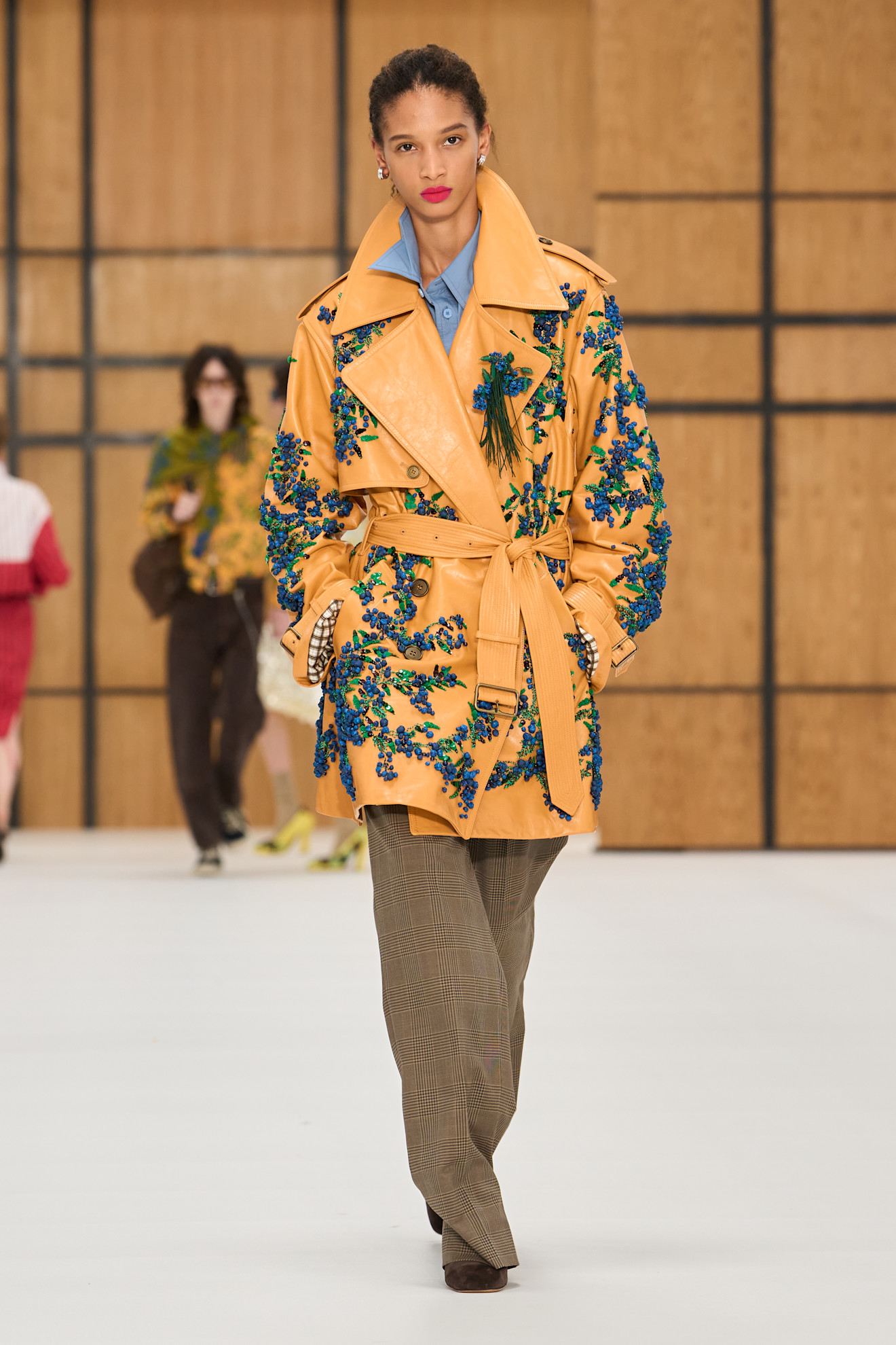 a model walks the burberry runway show.
