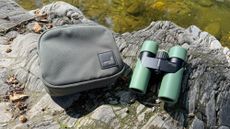 Swarovski CL Companion 8x30 and bag on a rock