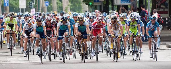 The bunch rolls through what was largely a ceremonial stage in Milan.