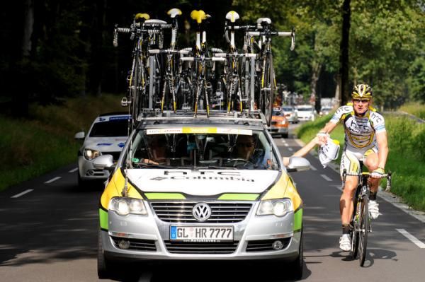 Greipel gets his feed bag from the HTC-Columbia team car.