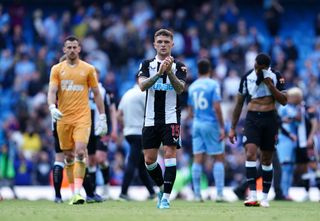 Kieran Trippier (centre) returned to action for Newcastle after injury