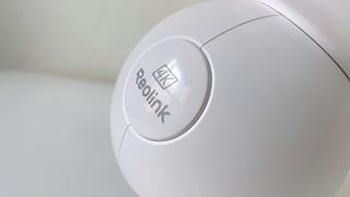 Close up of the Reolink 4K logo on the Reolink Altas PT Ultra smart home camera