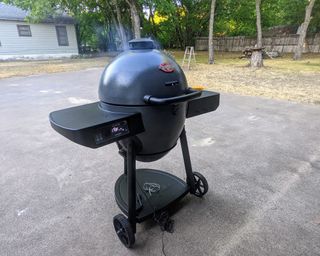 assembled kamado grill in a yard