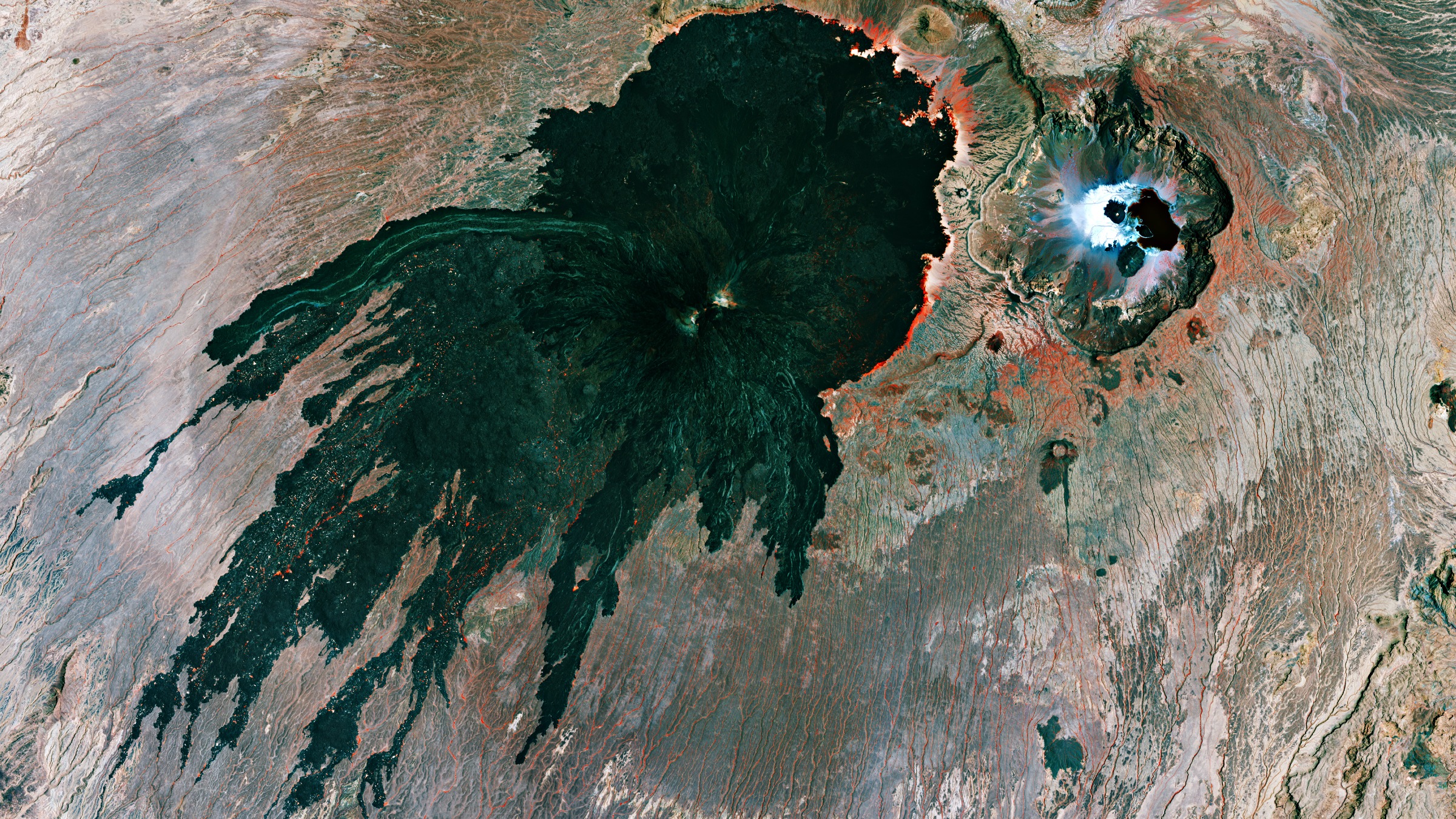 Chad's Toussidé volcano: petrified lava and skull-shaped caldera captured from the ISS