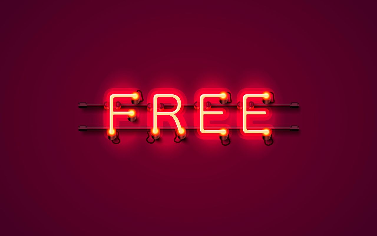 Neon sign on wall reads &amp;quot;free&amp;quot;