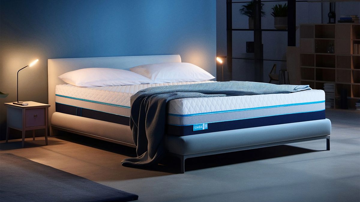 The Simba Hybrid Ultra Mattress on a bed frame in a bedroom