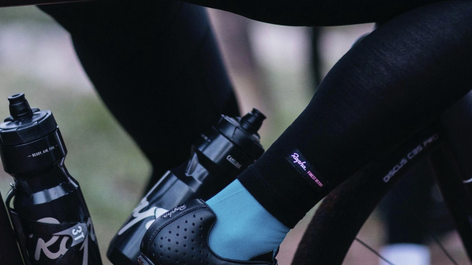 Should you wear your socks over or under your leg warmers? - Canadian  Cycling Magazine