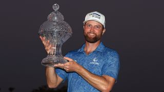 Chris Kirk with the trophy after his win at the 2023 Honda Classic