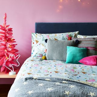 christmas bedding set with unicorn printed bedsheet and pink wall room