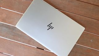  HP Envy 13 on a wooden table